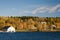 Boathouse on lake in fall