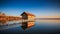 Boathouse in Stegen at the Ammersee at sunset in Bavaria Germany