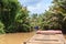 Boating on a dirty river Mekong Delta, Vietnam