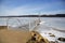 A boating dock at sunrise on a frozen lake.