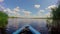 Boating on wide river, beautiful nature. Traveling, tourism, POV