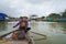 Boatman with Conical hats in Vietnam