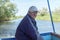 Boatman in a pleasure boat, on the Danube River, Vilkovo, Ukraine