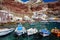 Boats at Amoudi port of Oia town on Santorini island