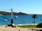 Boats anchored in the clear, placid waters of BÃºzios Bay