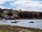 Boats anchored in Clonakilty Bay, sunny day. Irish seashore at low tide, seaside landscape.
