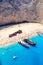 Boats anchored at Navagio beach, Zakynthos. Famous shipwreck on