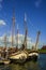 Boats anchored, water reflection and blue sky