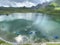 Boats on the artificial alpine lake Melchsee or Melch lake in the Uri Alps mountain massif, Melchtal - Switzerland