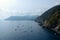 Boats in bay and high cliff in Vernazza, Italy