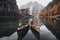 Boats on the Braies Lake ( Pragser Wildsee ) in Dolomites mountains