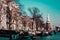 Boats, buildings and river in Amsterdam, Netherlands