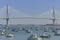 Boats at cadiz harbor with the bridge of the constitution of 18