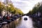 Boats on a canal in Amsterdam