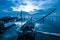 Boats or canoes in the dock and the blue sunset in Campeche Mexico