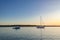 Boats on the Clarence RIver at sunset. Iluka NSW Australia