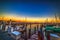 Boats in Coconut Grove harbor at sunset