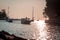 Boats coming into harbor on a summer day in South Haven Michigan