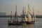 Boats cruising along the River Thames in London, UK