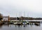 Boats in a dock, overcast