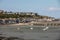 Boats on dry land at the beach at low tide in Cancale famous oysters production town, Brittany