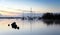 Boats and early morning mist