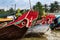 Boats with eyes and anchor painting decoration on the prow, anchored in the muddy waters of the Mekong Delta, Vietnam