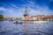 Boats in Front of Harlem De Adriaan Windmill on Spaarne River