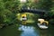 Boats going under a bridge in Luisenpark