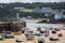 Boats grounded in St Ives Harbour alongside Smeatons Pier in St Ives, Cornwall, UK