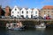 Boats in harbor and vehicles on quay, Eyemouth UK