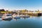 Boats in harbour in a beautiful coastal village on a sunny summer day