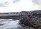 Boats in the harbour at Minehead in Somerset. The tide is out and the sky is stormy