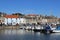 Boats in harbour, seafront shops, Anstruther, Fife