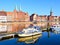 Boats and Historic buildings at Trave river, old town of Lubeck