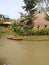 Boats and houses in the middle of the swamp