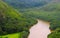 Boats on jungle river