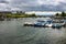 Boats on the Limmat river in Zurich, Switzerland with stormy clouds in the background