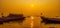 Boats lined up on Ganga  / Ganges river during sunrise in Varanasi, India