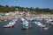 Boats in Lyme Regis harbour Dorset England UK with boats on a beautiful calm still day on the English Jurassic Coast