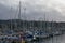 Boats in a marina on a cloudy day