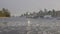 Boats in Marina, Coal Harbour, Urban City Skyline and Ice on water during Winter Season. Seawall in Stanley Park.