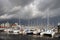 Boats in a marina, stormy sky