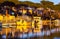 Boats in a marina at sunset