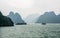 Boats in the mist in Halong Bay