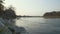 Boats moored along the banks of the Ticino river at sunset