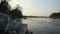 Boats moored along the banks of the Ticino river at sunset