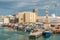 Boats moored in the harbor at Marina, Port Vell in Barcelona, Spain.