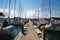 Boats moored in the marina of Pescara and the Ferris wheel background