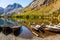 Boats are moored in shallow water